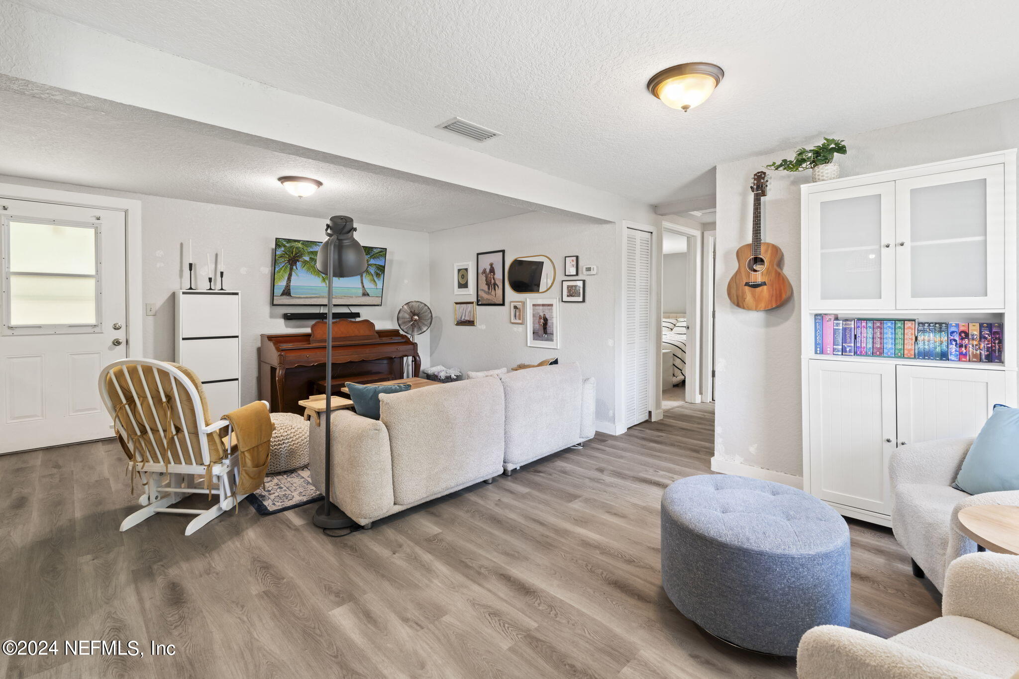 13548 Chauny Road Jacksonville, FL 32246 - Photo 4 of 55 a living room with furniture and a table