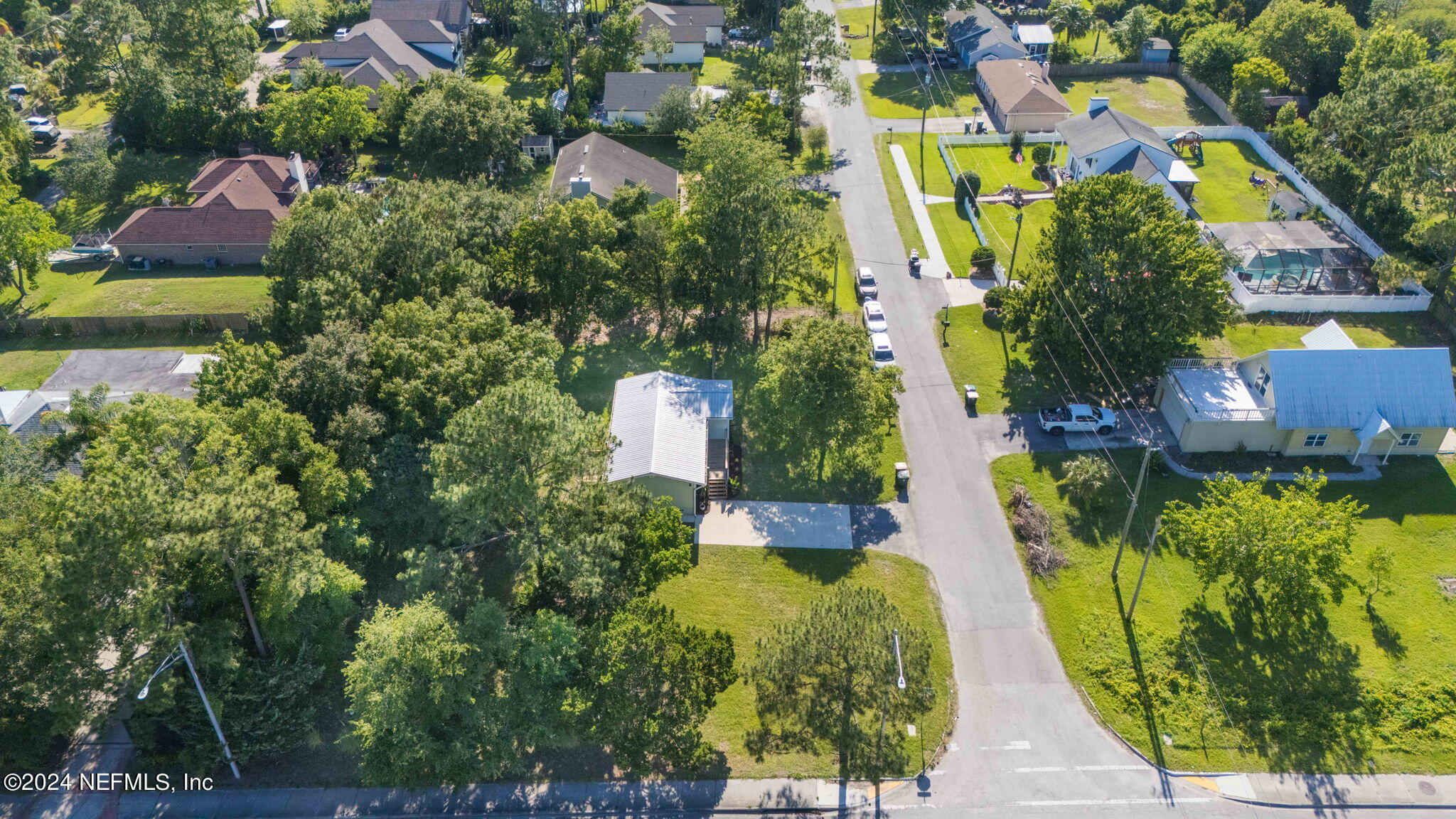 13548 Chauny Road Jacksonville, FL 32246 - Photo 47 of 55 an aerial view of residential house with outdoor space and swimming pool