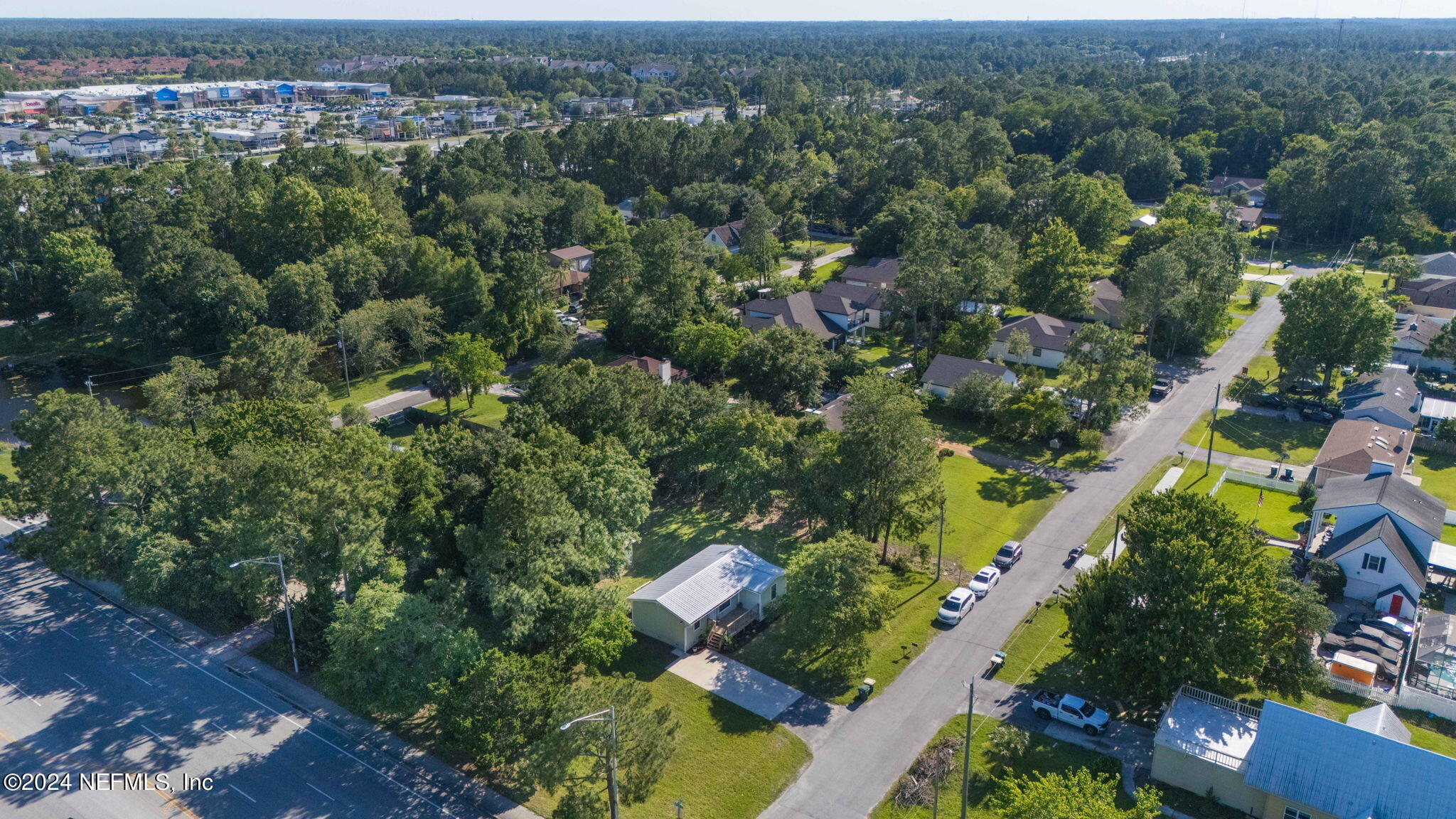13548 Chauny Road Jacksonville, FL 32246 - Photo 48 of 55 an aerial view of a house with a yard