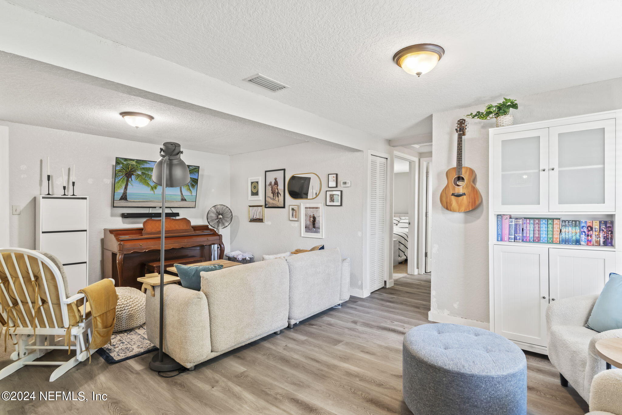 13548 Chauny Road Jacksonville, FL 32246 - Photo 7 of 55 a living room with furniture and a table