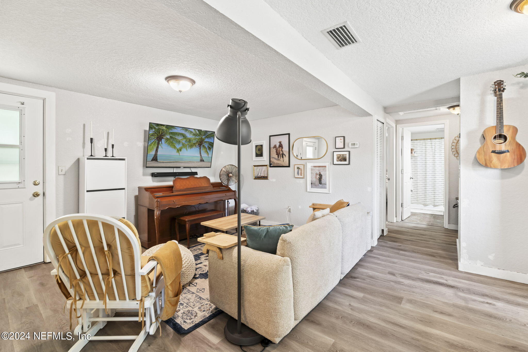 13548 Chauny Road Jacksonville, FL 32246 - Photo 8 of 55 a living room with furniture and wooden floor
