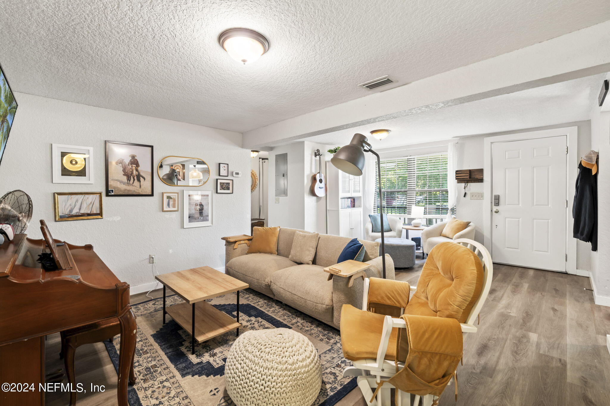 13548 Chauny Road Jacksonville, FL 32246 - Photo 9 of 55 a living room with furniture and wooden floor