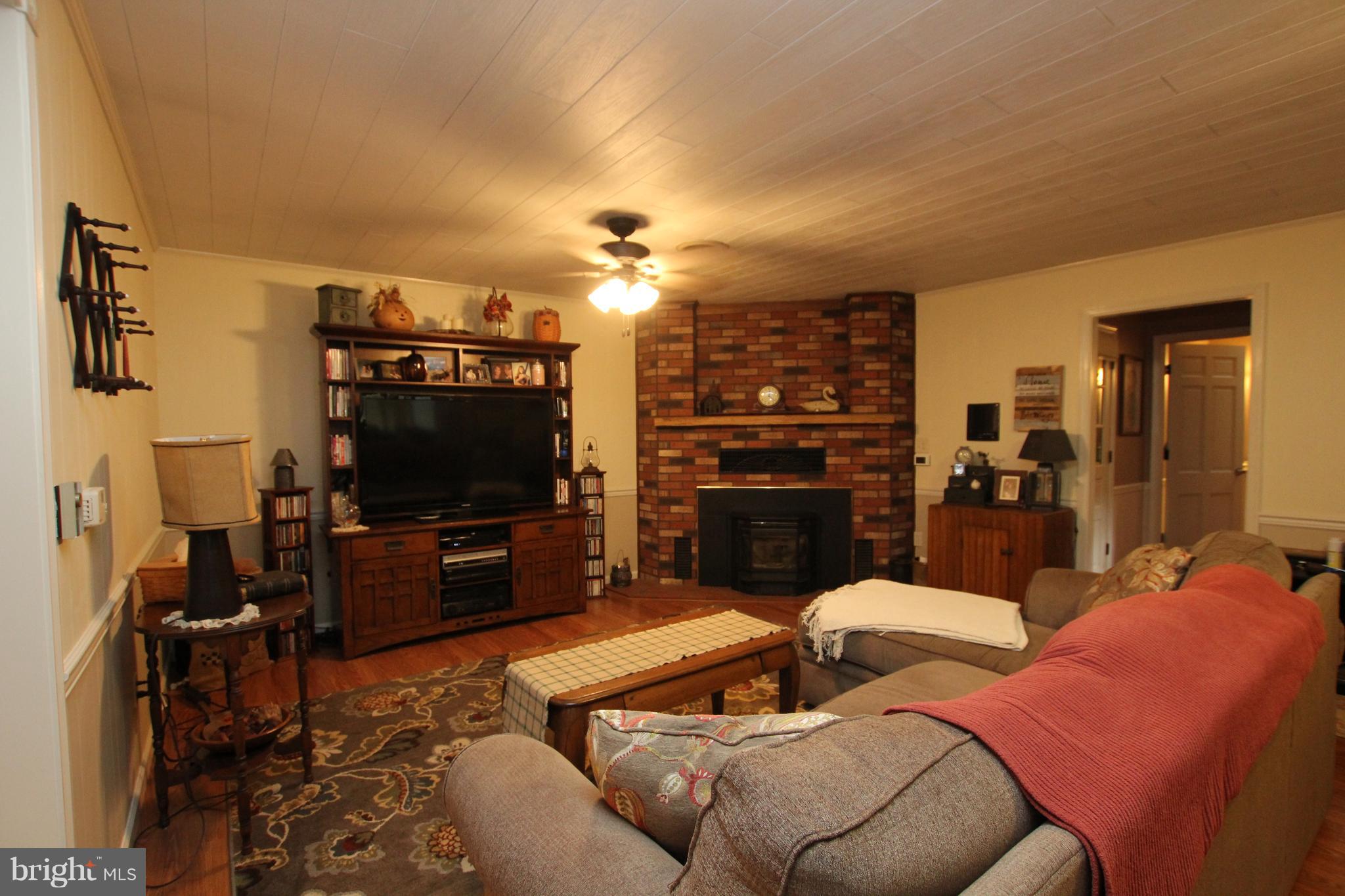 26558 Kaye Road Laurel, DE 19956 - Photo 11 of 43 Family Room w/Pellet Stove