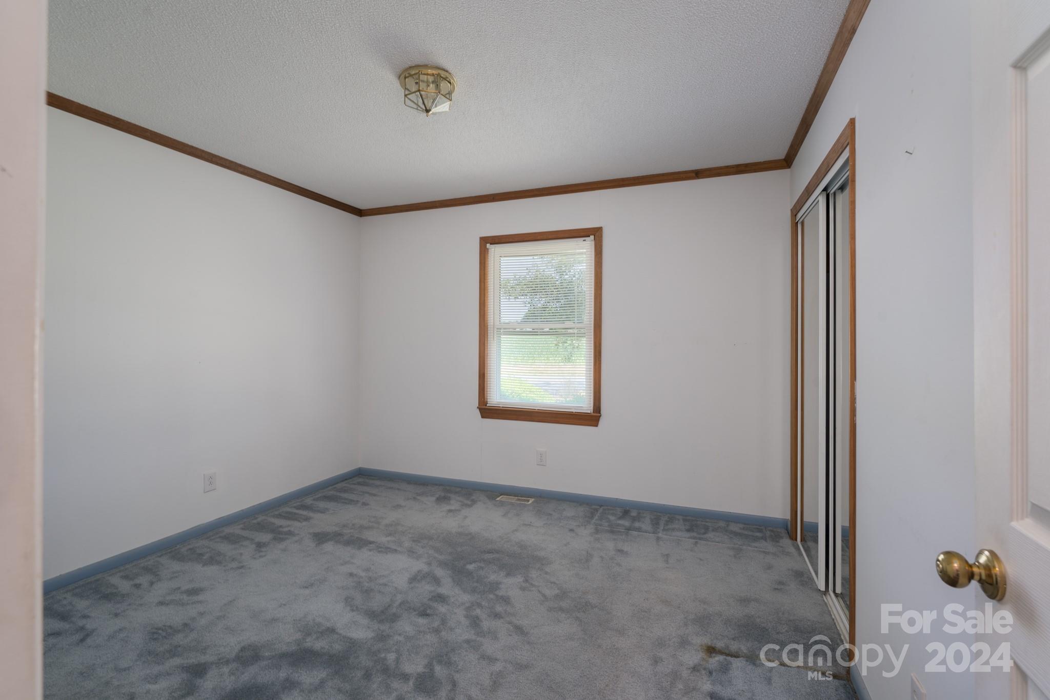 3064 Armenia Road Chester, SC 29706 - Photo 7 of 19 an empty room with a window