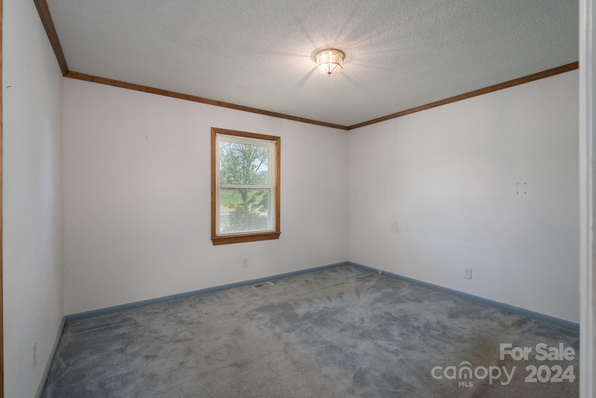 3064 Armenia Road Chester, SC 29706 - Photo 9 of 19 an empty room with a window