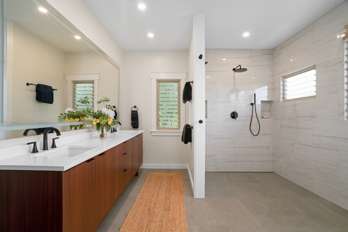 3275 Kalihiwai Road, Unit A & B Princeville, HI 96722 - Photo 13 of 30 a bathroom with a double vanity sink a mirror and shower