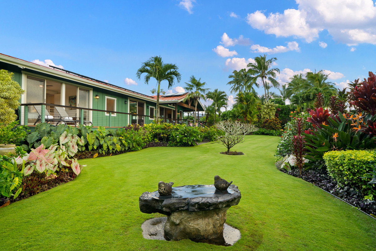 3275 Kalihiwai Road, Unit A & B Princeville, HI 96722 - Photo 17 of 30 a front view of a house with garden