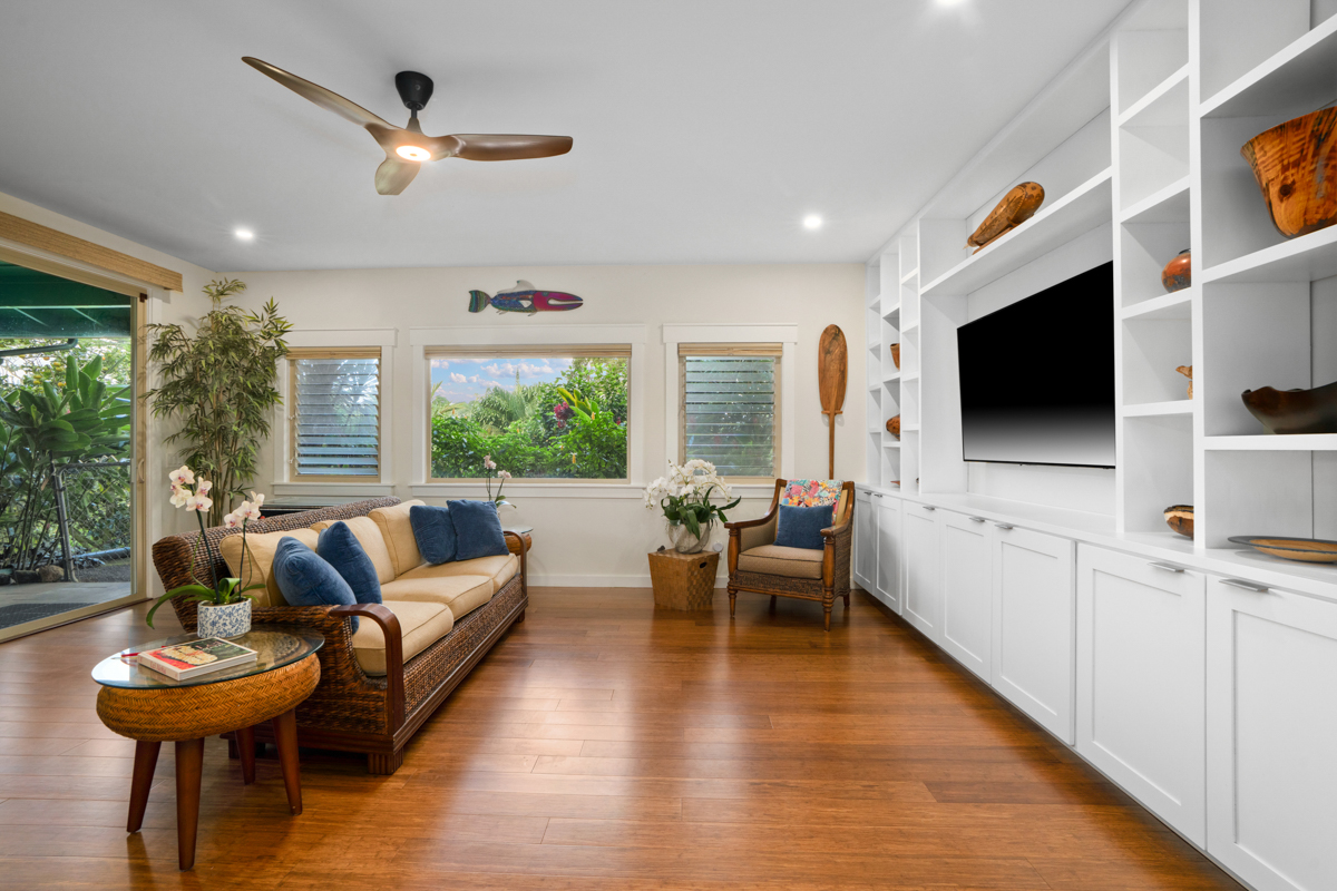 3275 Kalihiwai Road, Unit A & B Princeville, HI 96722 - Photo 18 of 30 a living room with furniture and a flat screen tv