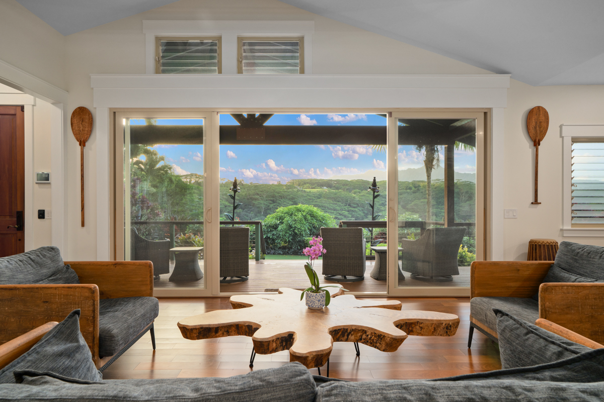 3275 Kalihiwai Road, Unit A & B Princeville, HI 96722 - Photo 3 of 30 a living room with furniture and a large window