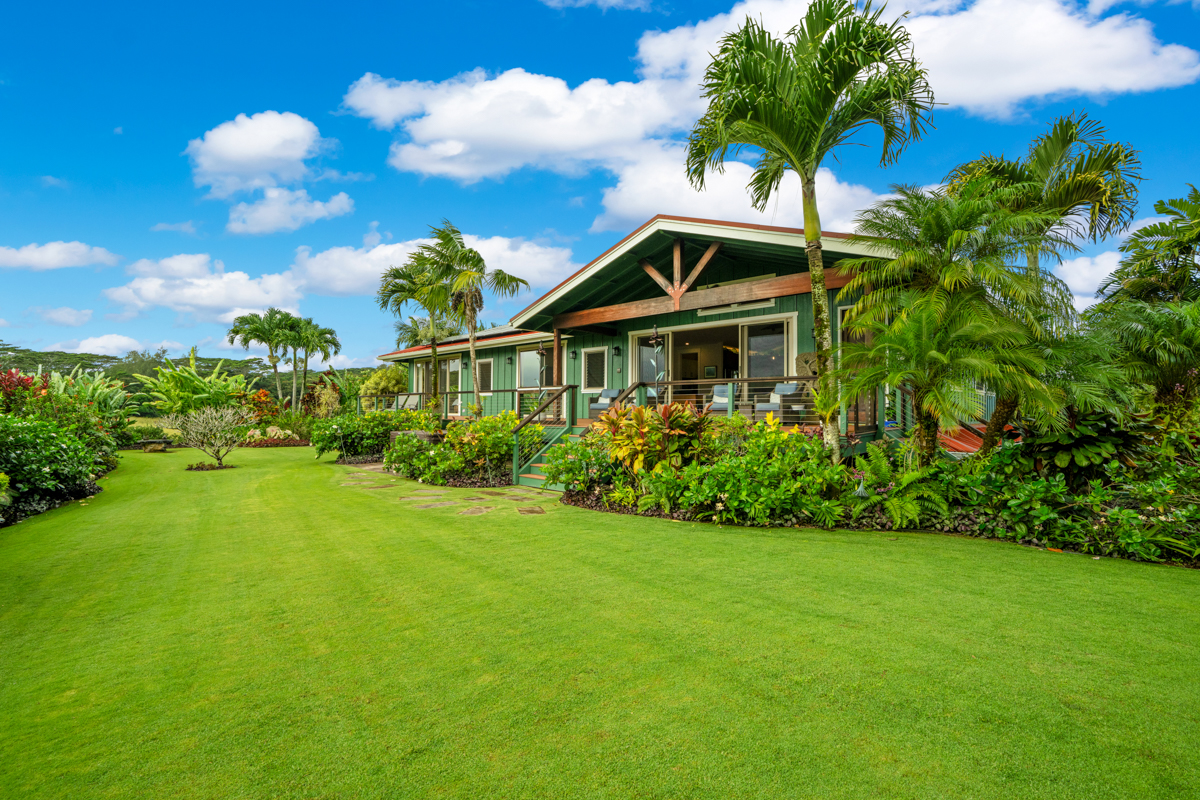 3275 Kalihiwai Road, Unit A & B Princeville, HI 96722 - Photo 7 of 30 a front view of a house with garden