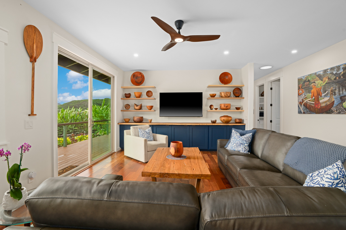 3275 Kalihiwai Road, Unit A & B Princeville, HI 96722 - Photo 10 of 30 a living room with furniture and a flat screen tv