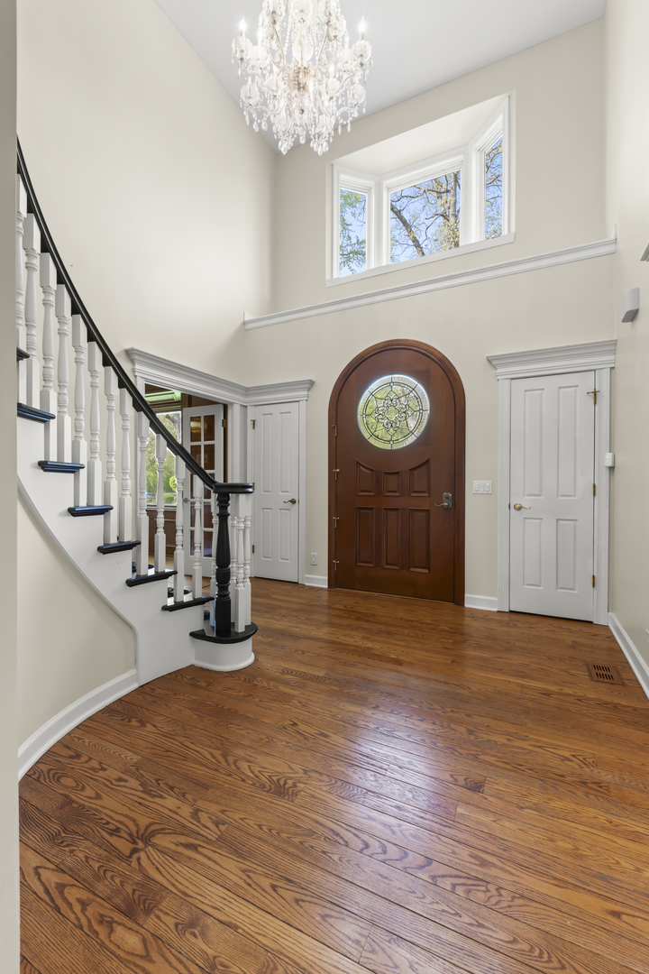 1S151 Winfield Road Wheaton, IL 60189 - Photo 10 of 73 a view of an entryway with wooden floor