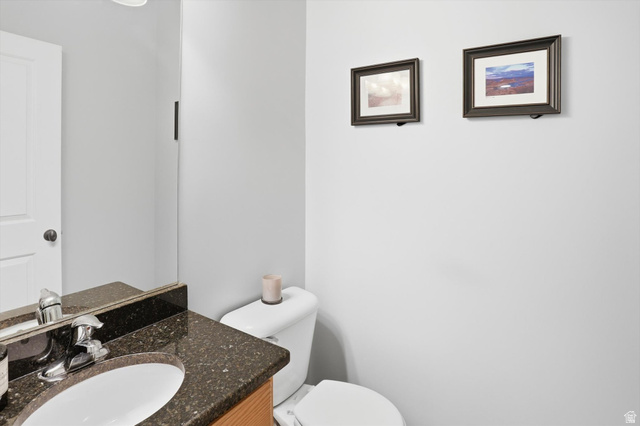 14820 175 East Draper, UT 84020 - Photo 30 of 39 Half bathroom featuring vanity and toilet
