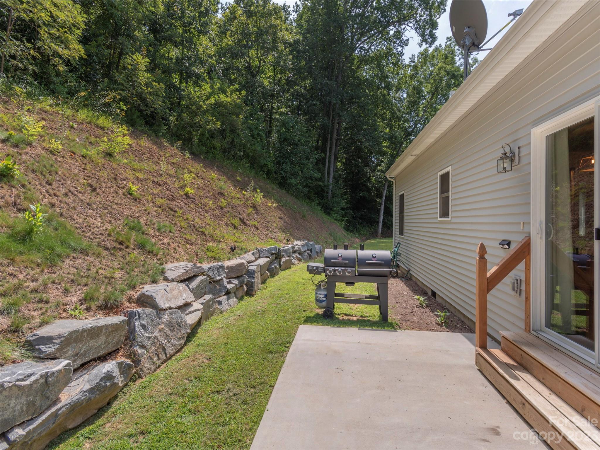 187 Richards Ridge Canton, NC 28716 - Photo 19 of 23 a view of a back yard of the house