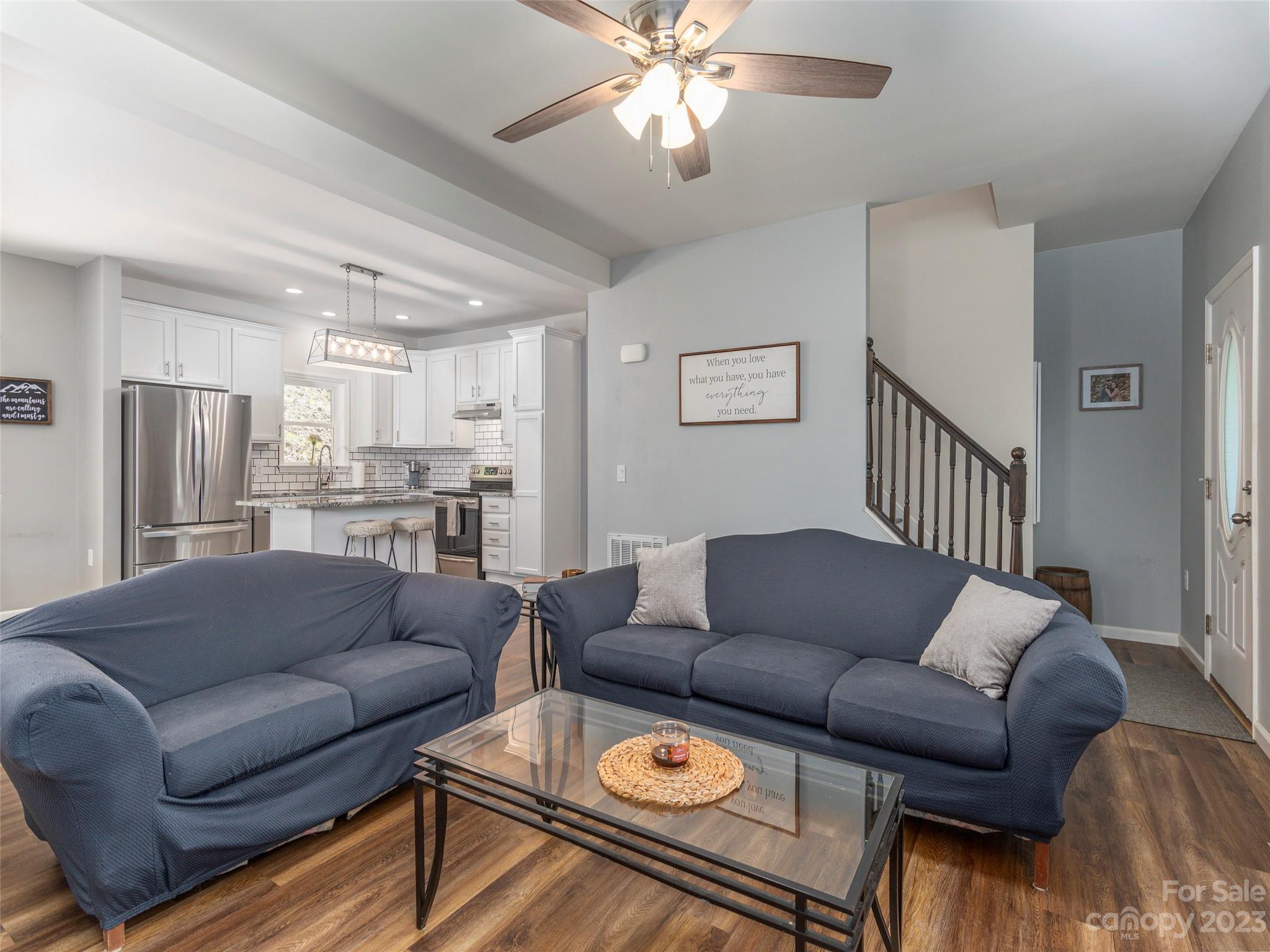 187 Richards Ridge Canton, NC 28716 - Photo 4 of 23 a living room with furniture and a view of kitchen