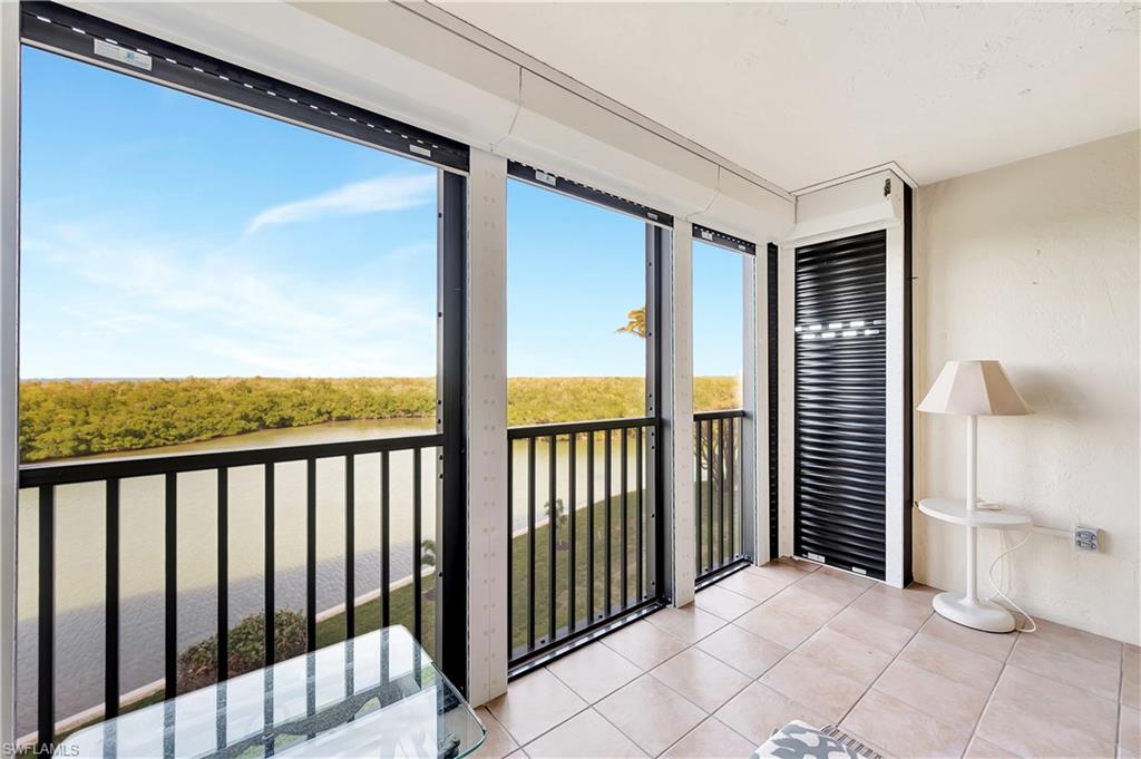 15 Bluebill Avenue, Unit 304 Naples, FL 34108 - Photo 32 of 43 Screened Lanai