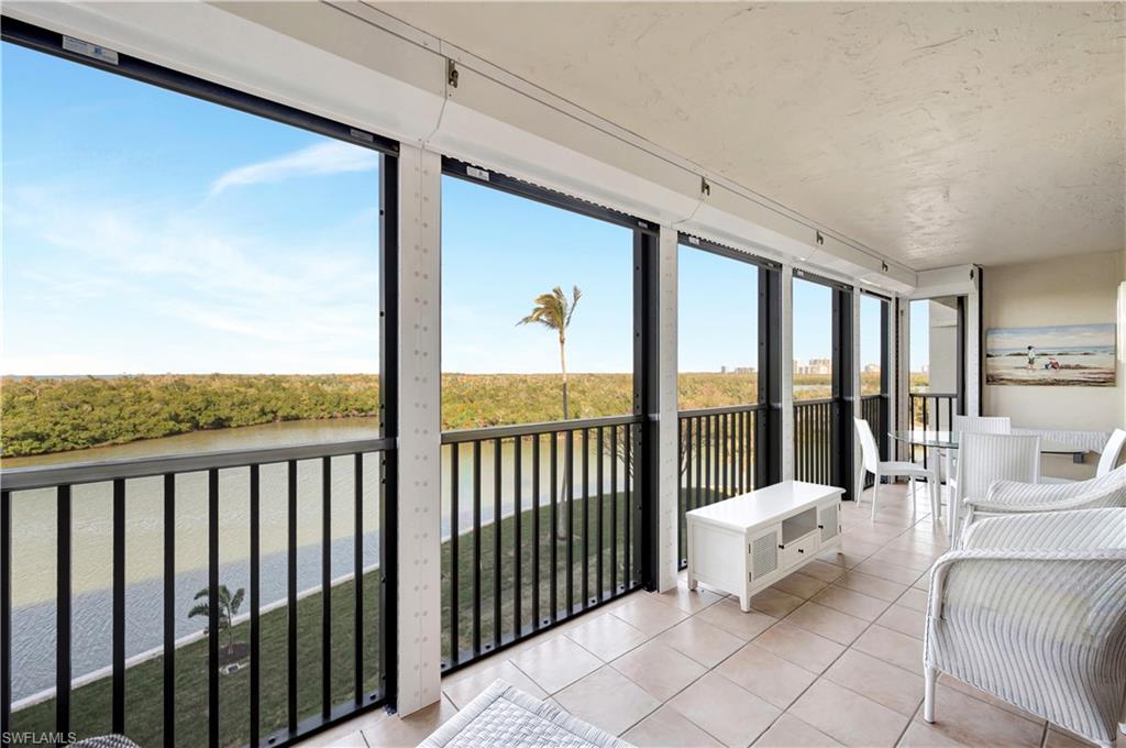 15 Bluebill Avenue, Unit 304 Naples, FL 34108 - Photo 5 of 43 Screened Lanai