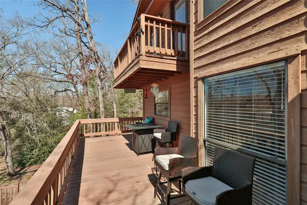 a view of a terrace with sitting area