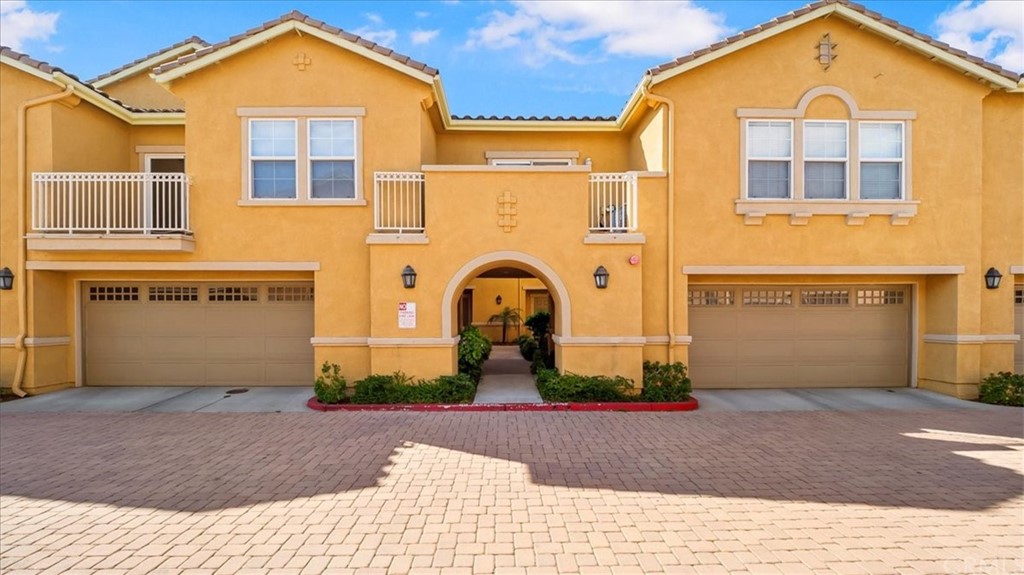 11450 Church Street, Unit 74 Rancho Cucamonga, CA 91730 - Photo 1 of 1 a front view of a house