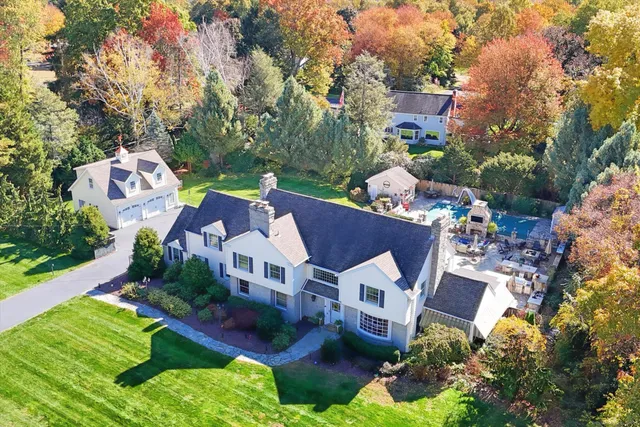 an aerial view of a house with a garden