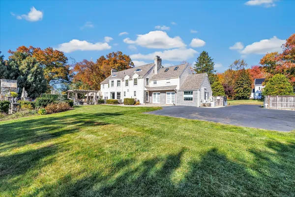 a view of a house with a big yard