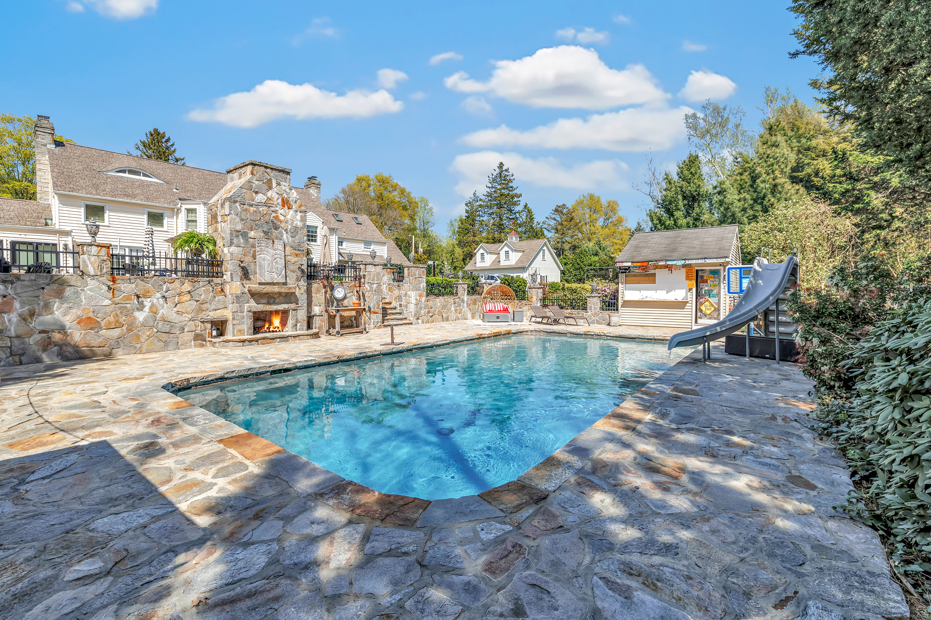 830 Bayberry Lane Orange, CT 06477 - Photo 31 of 40 a view of a swimming pool with a lake view