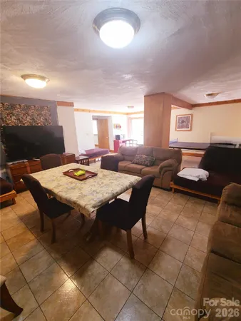 a bedroom with bed and window