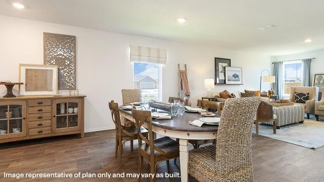 a view of a livingroom with furniture and window