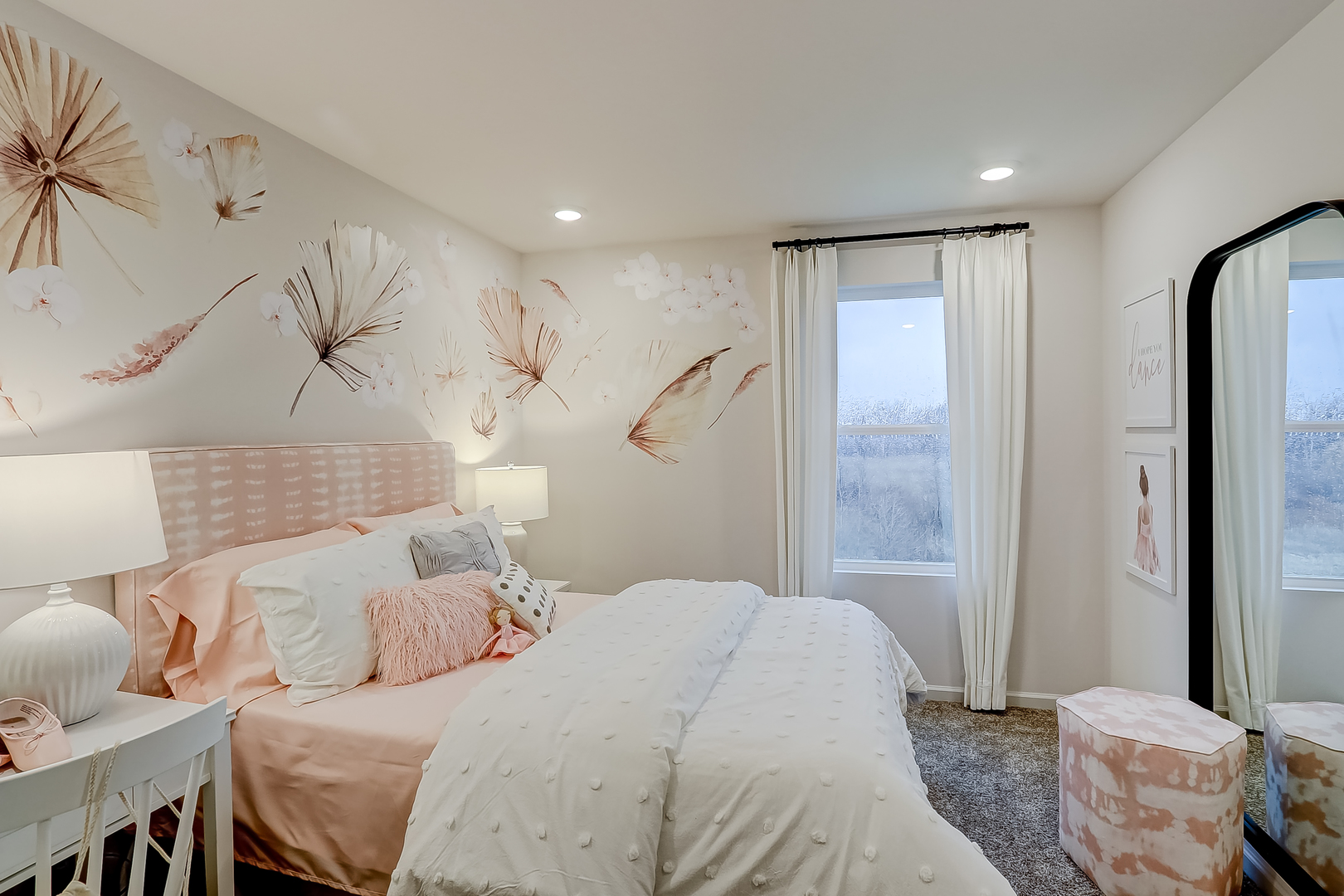 496 Endicott Road South Elgin, IL 60177 - Photo 29 of 33 a bedroom with a large bed and a chandelier