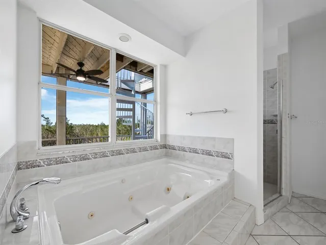 a view of an entryway with a tv