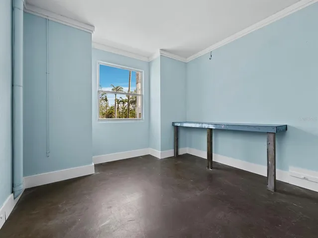 a view of a backyard with swimming pool