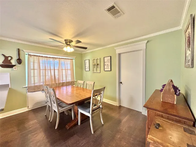 a white refrigerator freezer sitting inside of a kitchen