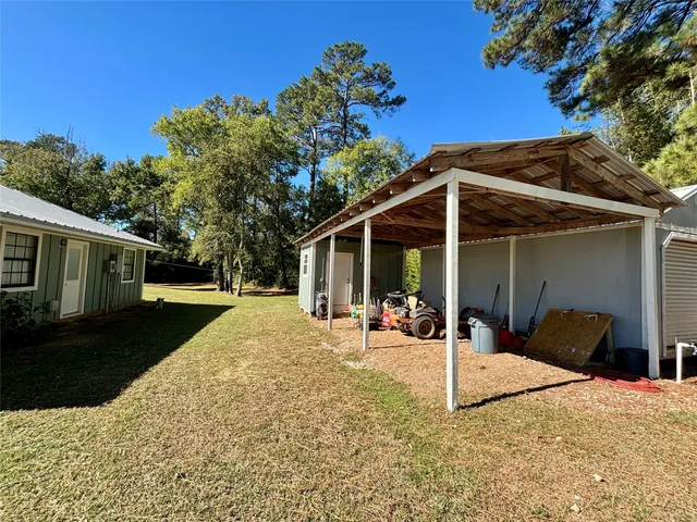 a house with trees in the background
