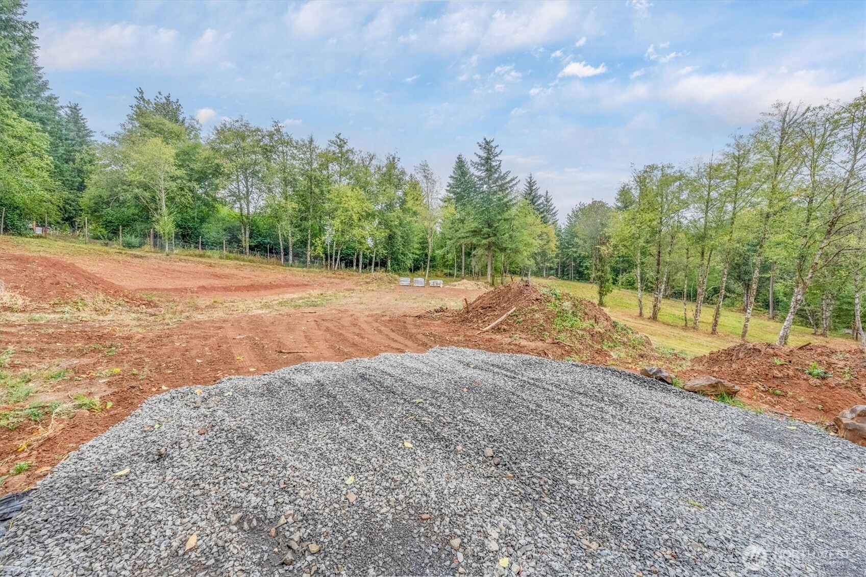 133 Silverthistle Road Winlock, WA 98596 - Photo 3 of 15 a backyard of a house with large trees