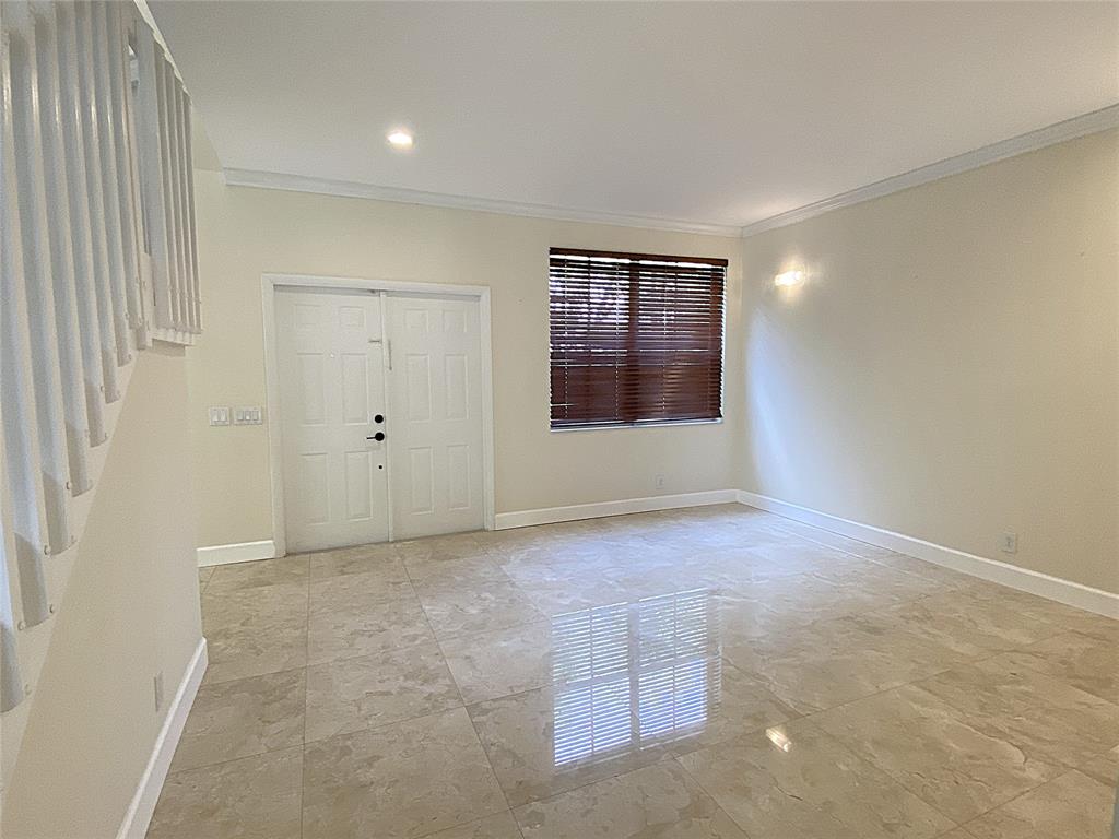 4375 Foxtail Lane Weston, FL 33331 - Photo 26 of 84 an empty room with windows