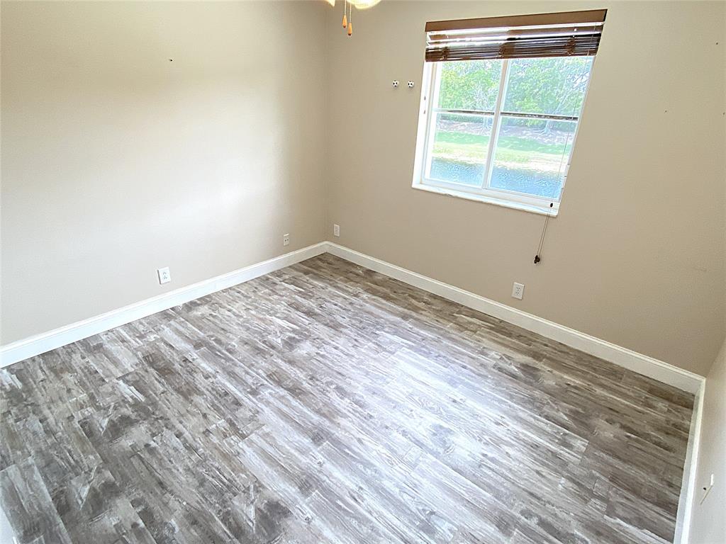 4375 Foxtail Lane Weston, FL 33331 - Photo 46 of 84 an empty room with a window