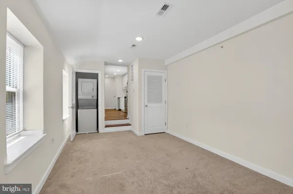 an empty room with a natural light