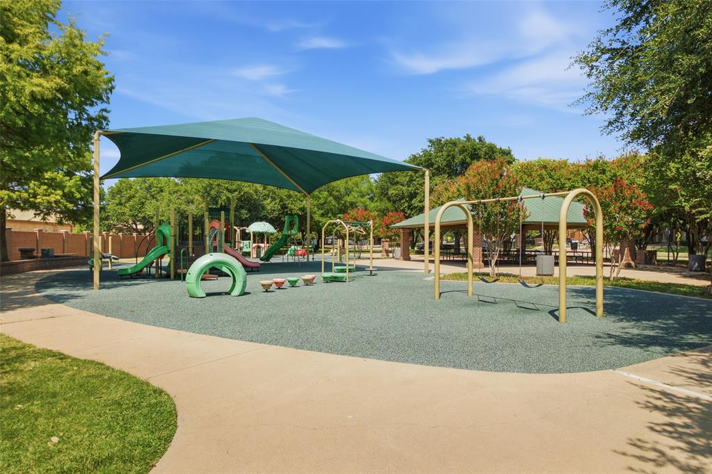 3903 Rive Lane Addison, TX 75001 - Photo 39 of 40 Les Lacs Park features a full playground with shade sails, slides, swings, and rubber safety surfacing, plus a picnic pavilion surrounded by blooming crape myrtles. A top-tier neighborhood park, all within walking distance.