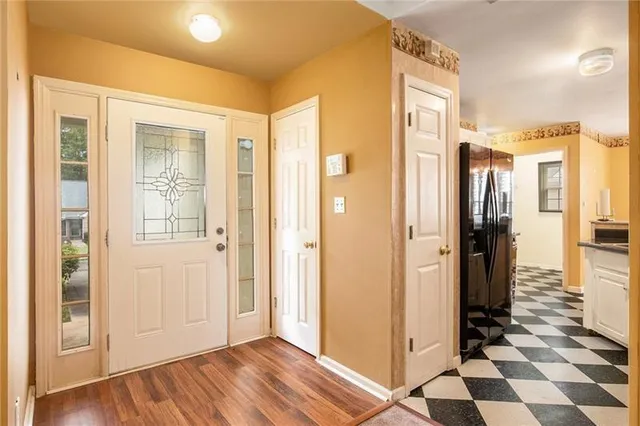 a view of a bathroom with a glass door