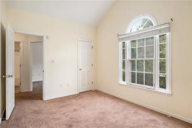 an empty room with windows