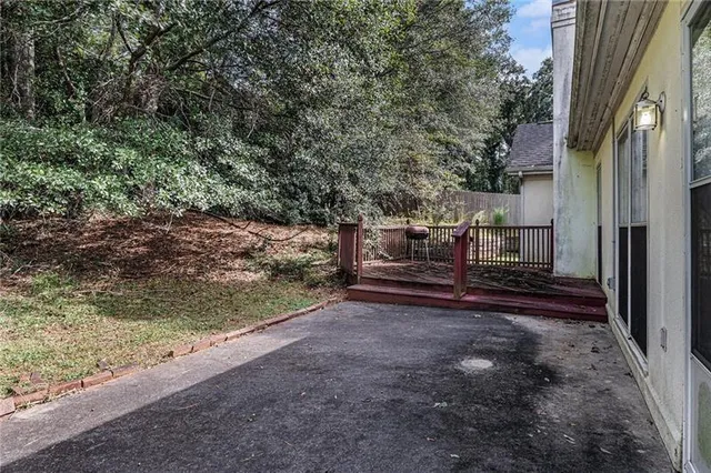 a view of backyard with outdoor space