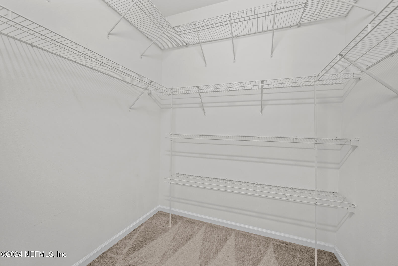7990 Baymeadows Road East, Unit 905 Jacksonville, FL 32256 - Photo 18 of 37 Second Owner's Walk-in Closet