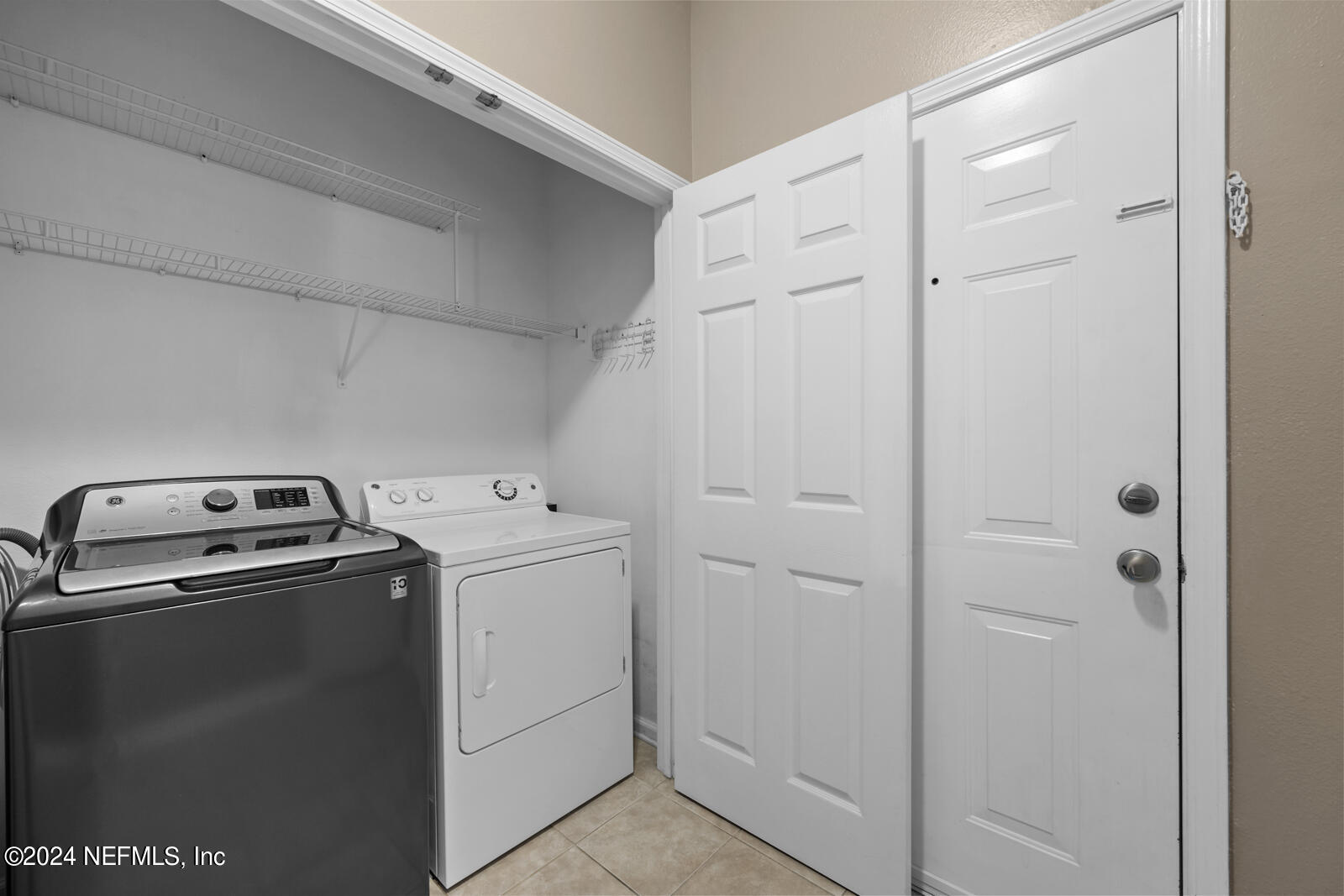 7990 Baymeadows Road East, Unit 905 Jacksonville, FL 32256 - Photo 20 of 37 Inside Laundry Area w/Washer & Dryer