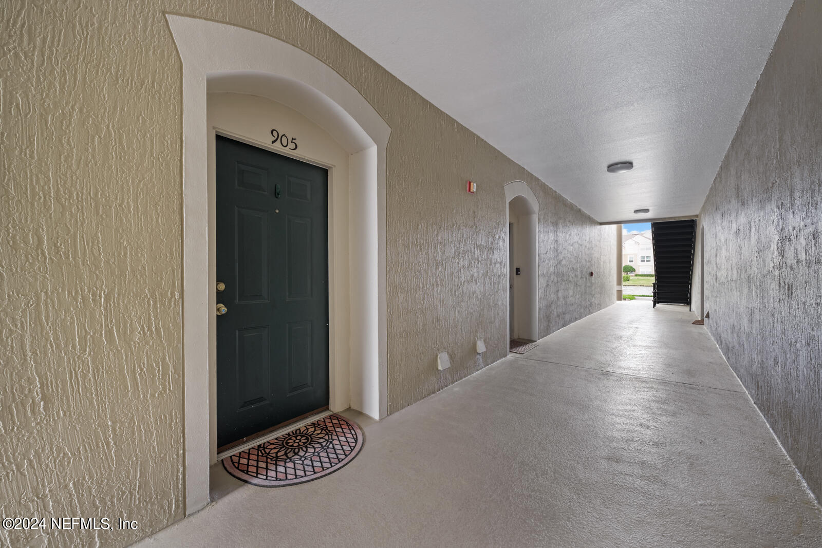 7990 Baymeadows Road East, Unit 905 Jacksonville, FL 32256 - Photo 25 of 37 Breezeway