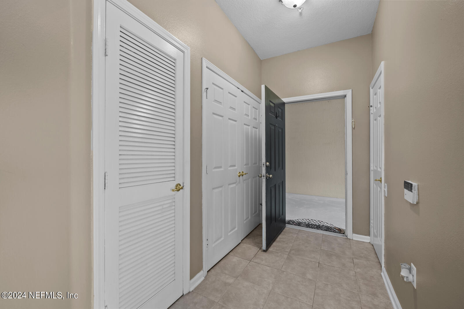 7990 Baymeadows Road East, Unit 905 Jacksonville, FL 32256 - Photo 4 of 37 Interior Foyer