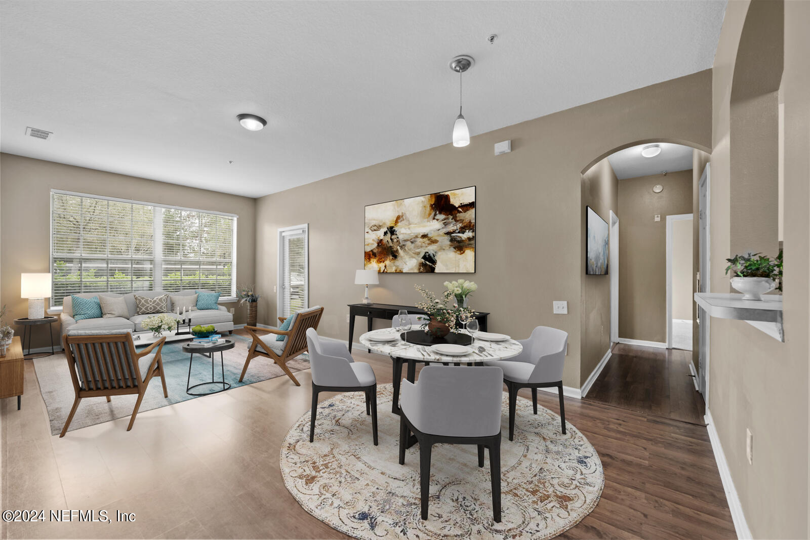 7990 Baymeadows Road East, Unit 905 Jacksonville, FL 32256 - Photo 6 of 37 Living Dining Area virtually staged