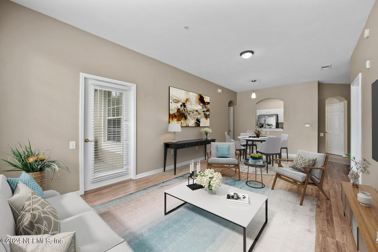 7990 Baymeadows Road East, Unit 905 Jacksonville, FL 32256 - Photo 8 of 37 Living Dining Area virtually staged