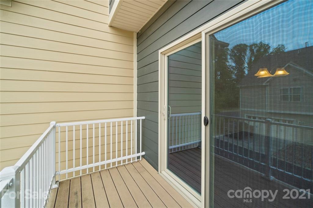 206 Butterfly Place, Unit 185 Tega Cay, SC 29708 - Photo 20 of 36 a view of outdoor space with deck and shower