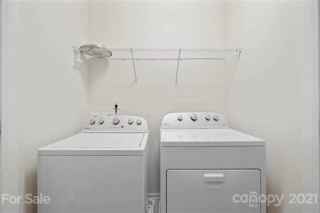 206 Butterfly Place, Unit 185 Tega Cay, SC 29708 - Photo 21 of 36 a utility room with dryer and washer