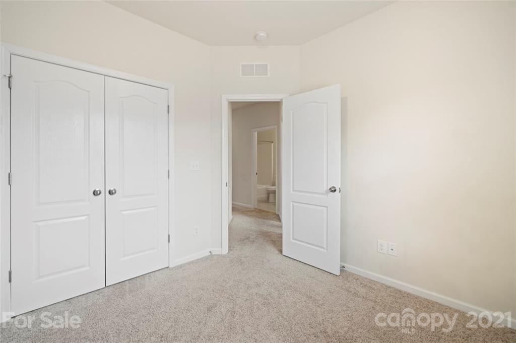 206 Butterfly Place, Unit 185 Tega Cay, SC 29708 - Photo 32 of 36 a view of an empty room
